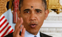 <p>A fly lands between the eyes of U.S. President Barack Obama while he speaks in the State Dining Room of the White House in Washington, January 24, 2013. (Larry Downing/Reuters) </p>