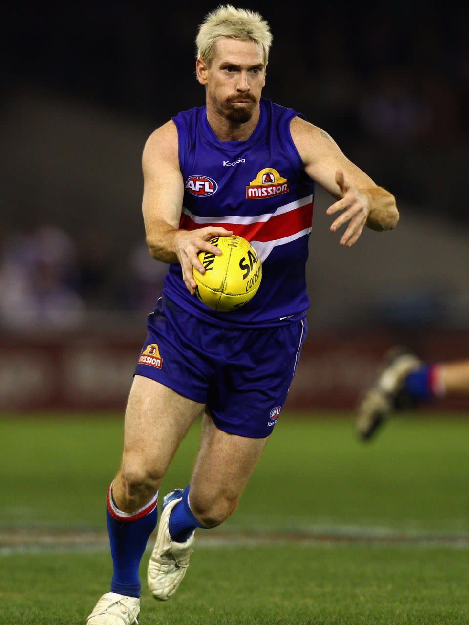 Footie player Jason Akermanis's signature look is very much like Shane's new style. Source: Getty