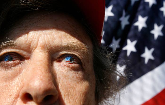 Closeup of someone's eyes with the American flag in the background