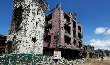 A part of a bullet riddled mosque is seen in the Islamic city of Marawi, southern Philippines April 19, 2018. Picture taken April 19, 2018. REUTERS/Erik De Castro