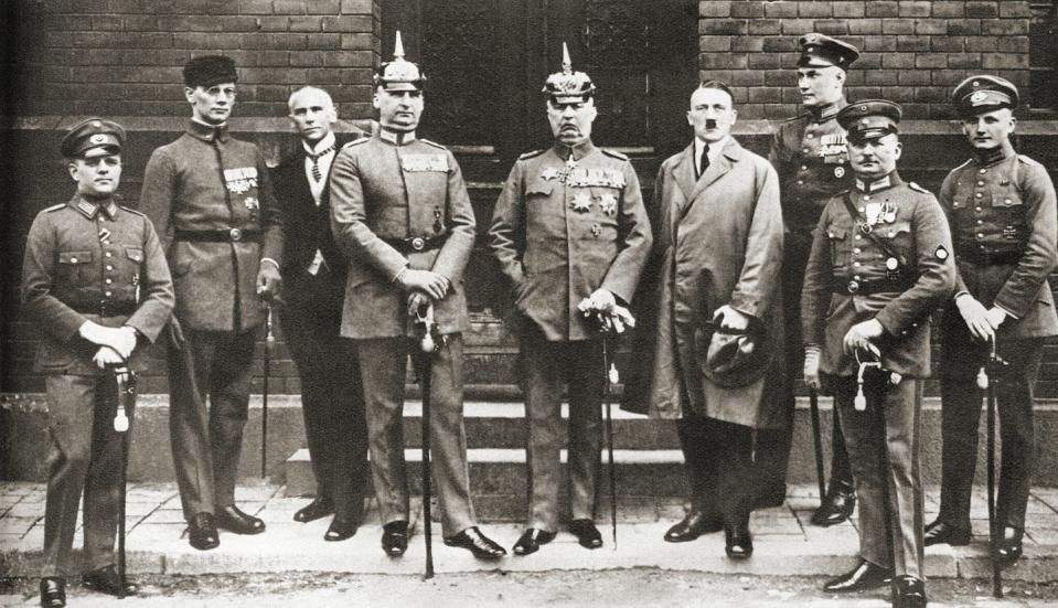 Adolf Hitler, fourth from right, with his fellow defendants in the Munich Putsch trial of 1924 for their failed coup attempt by the Nazi party to seize power in Munich, Bavaria, in November 1923. <a href="https://www.gettyimages.com/detail/news-photo/the-defendants-in-the-munich-putsch-trial-aka-beer-hall-news-photo/1062153496?adppopup=true" rel="nofollow noopener" target="_blank" data-ylk="slk:Universal History Archive/Universal Images Group via Getty Images;elm:context_link;itc:0;sec:content-canvas" class="link ">Universal History Archive/Universal Images Group via Getty Images</a>