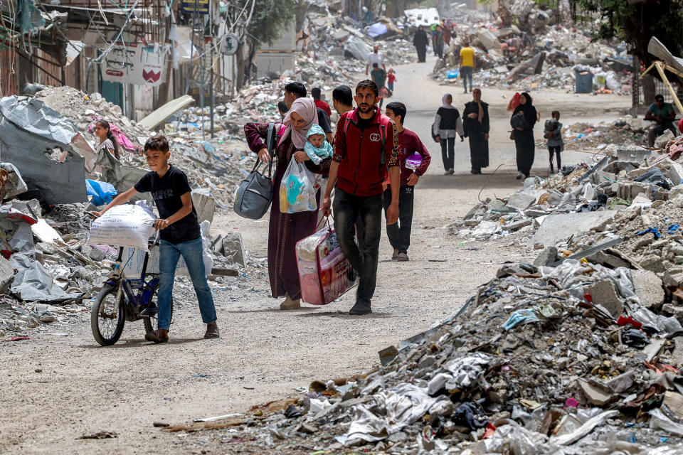 Civilians evacuate northern Gaza (AFP via Getty Images)