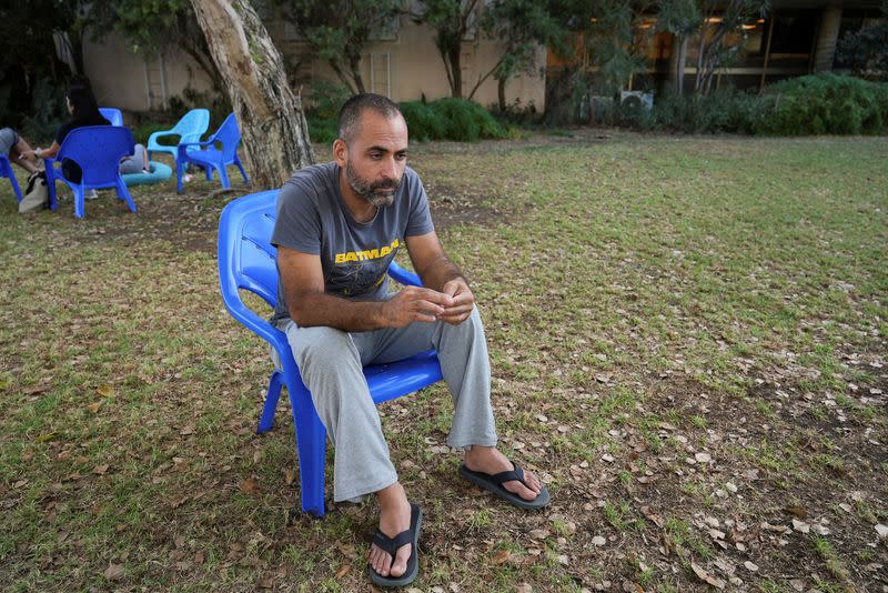 Avihai Brodutch, whose wife and three children were abducted by Hamas militants on October 7 from their home in Kibbutz Kfar Aza, is photographed during an interview with Reuters