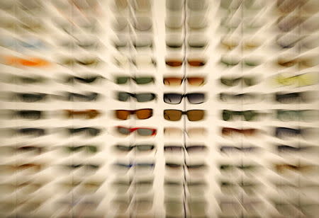 Some of the hundreds of sunglasses are seen on display at the annual ASR convention in San Diego in this September 9, 2005 file photo. REUTERS/Mike Blake/Files