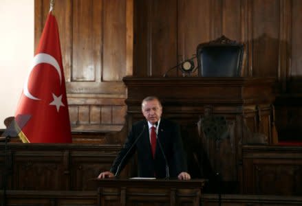 FILE PHOTO: Turkish President Tayyip Erdogan makes a speech at the old parliament building in Ankara, Turkey July 13, 2018. REUTERS/Umit Bektas/File Photo