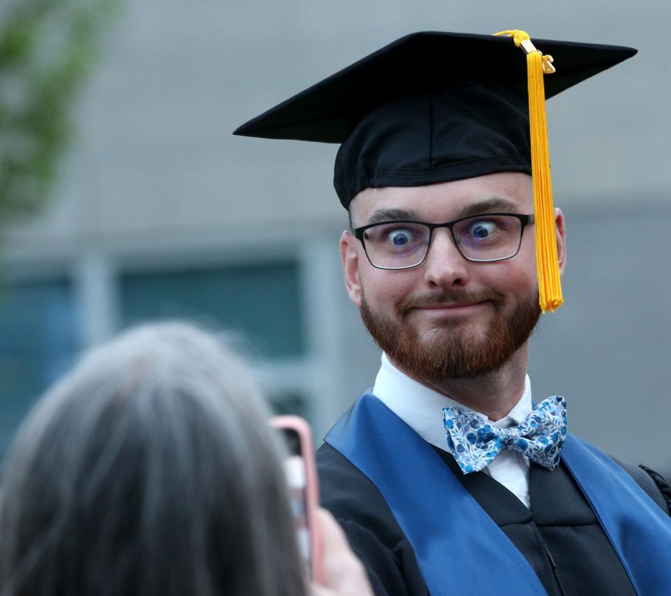 York County Community College graduates have some fun following the ceremony, posing with family and friends May 17, 2024.