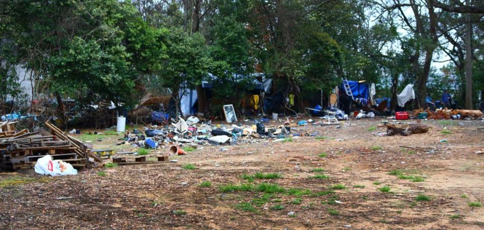 Homeless encampment filled with trash on 3rd Avenue near 32nd Street in Columbus. 3/5/24