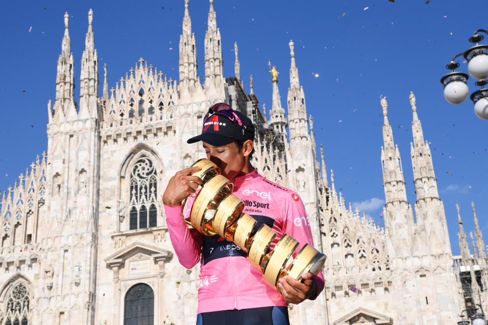 Colombia’s Egan Bernal celebrates on podium after completing the final stage to win the Giro d'Italia cycling race, in Milan, Italy, Sunday, May 30, 2021. (Gian Mattia D'Alberto/LaPresse via AP)