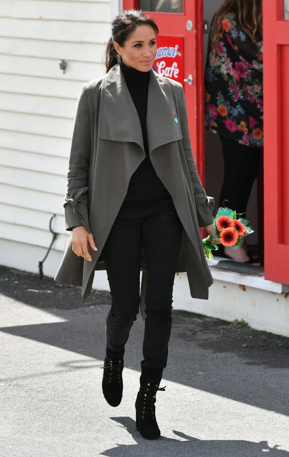 A casual event during Markle's visit to Wellington, New Zealand, brought back a royal wardrobe favorite: the waterfall coat.