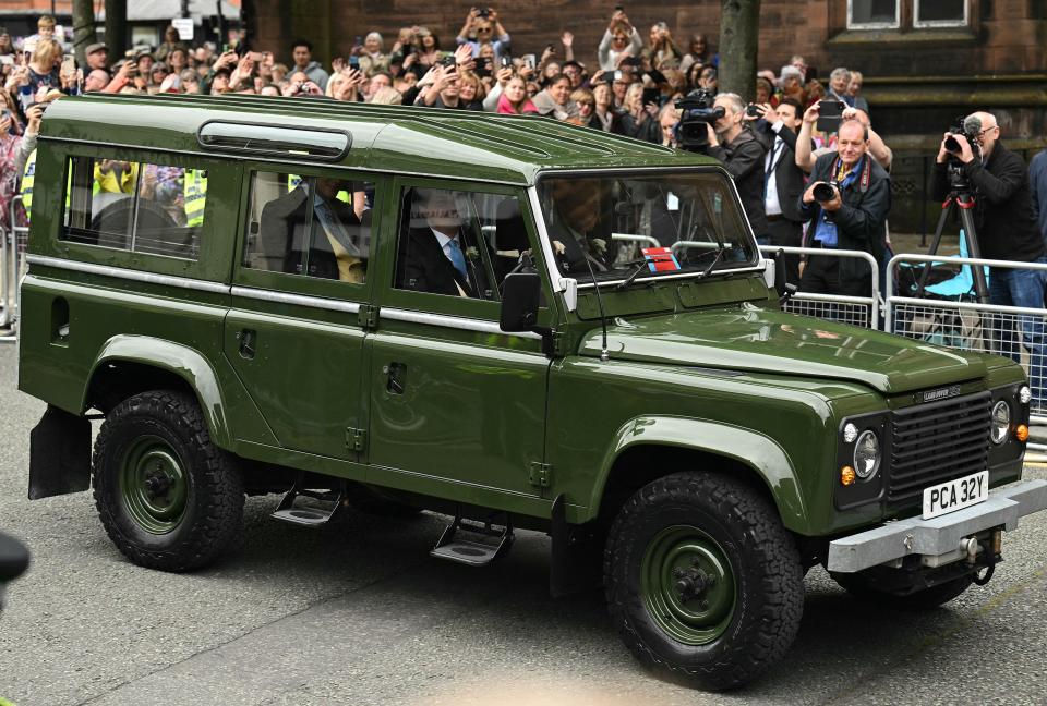 The Duke arrives in a green Land Rover vehicle at the cathedral (AFP via Getty Images)