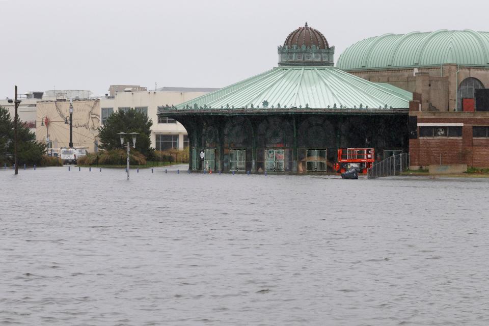 Water from Wesley Lake reaches the Carousel House on The Asbury Park boardwalk Friday afternoon, September 29, 2023.