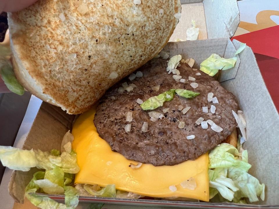 McDonald's is rolling out changes to elevate its burgers. We tried the improved burgers in Los Angeles and Ohio.  A closer look at the new onion prep.