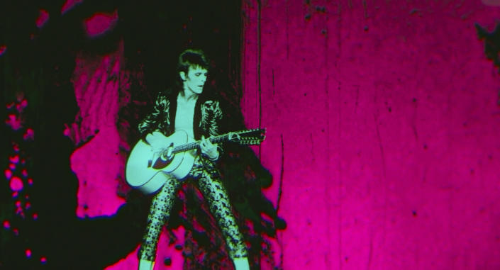 This image released by Neon shows a scene from "Moonage Daydream," a film about David Bowie. (Neon via AP)