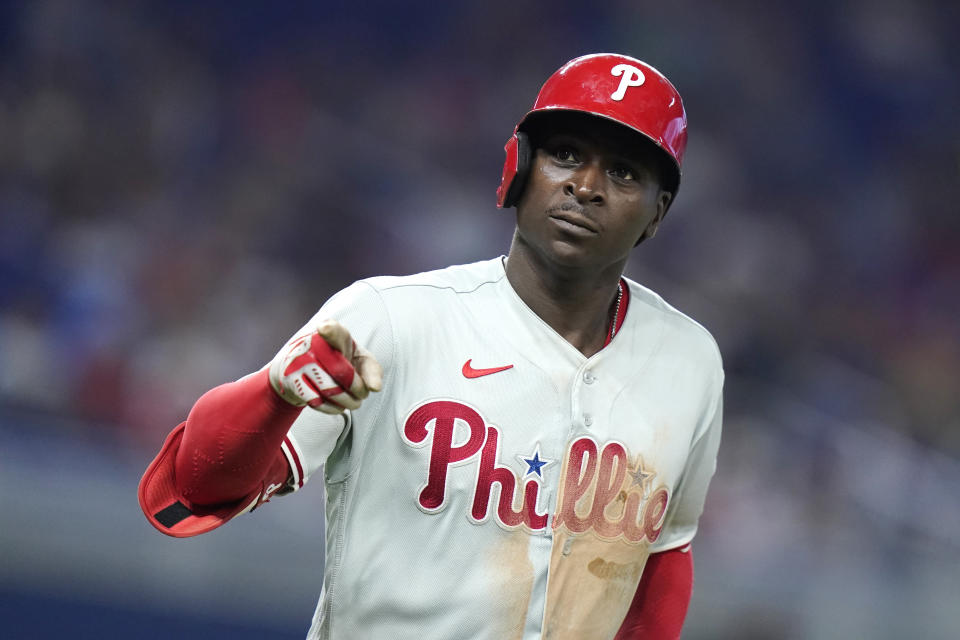 Philadelphia Phillies' Didi Gregorius gestures after hitting a two-run home run during the eighth inning of the team's baseball game against the Miami Marlins, Saturday, July 16, 2022, in Miami. The Phillies won 10-0. (AP Photo/Lynne Sladky)