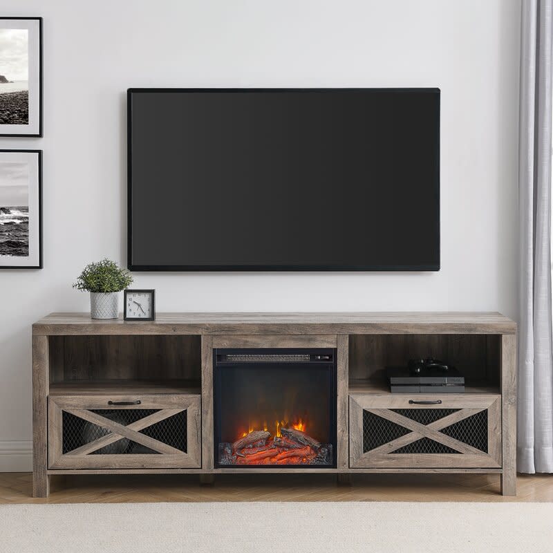 <p><a href="https://go.redirectingat.com?id=74968X1596630&url=https%3A%2F%2Fwww.wayfair.com%2F--%2Fpdp%2Fgracie-oaks--tansey-tv-stand-for-tvs-up-to-85-with-electric-fireplace-included-x211195214-l6-w005404874.html&sref=https%3A%2F%2Fwww.housebeautiful.com%2Fshopping%2Fbest-stores%2Fg43965184%2Fwayfair-memorial-day-sales-2023%2F" rel="nofollow noopener" target="_blank" data-ylk="slk:Shop Now;elm:context_link;itc:0;sec:content-canvas" class="link rapid-noclick-resp">Shop Now</a></p><p>Tansey TV Stand with Electric Fireplace</p><p>$405.99</p><p>wayfair.com</p>