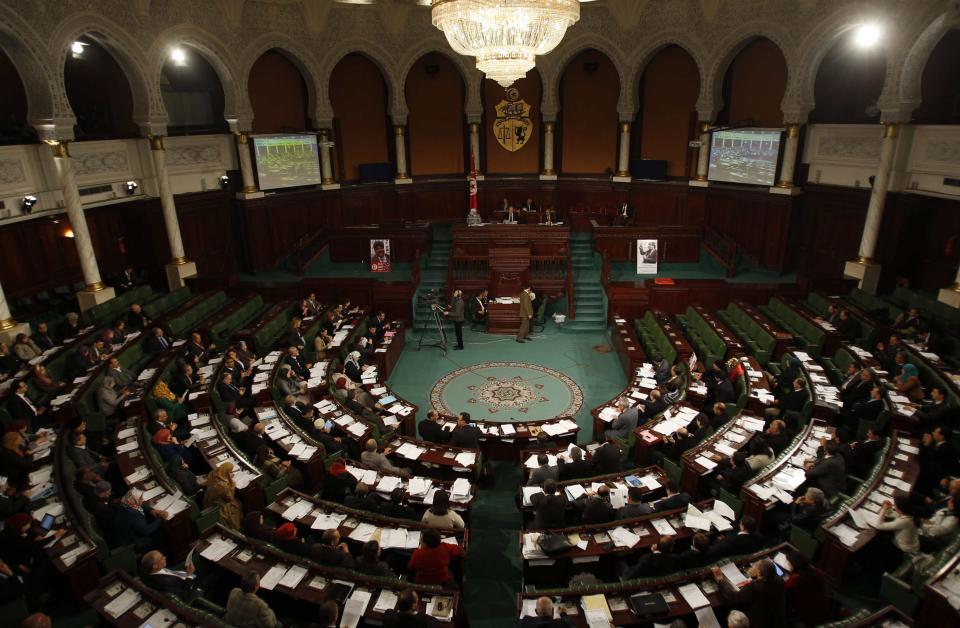 A general view of Tunisia's Constituent Assembly President Mustafa Ben Jaafar (C) speaking during the beginning of voting on the country's constitution drafts, in Tunis January 3, 2014. REUTERS/Zoubeir Souissi (TUNISIA - Tags: POLITICS)