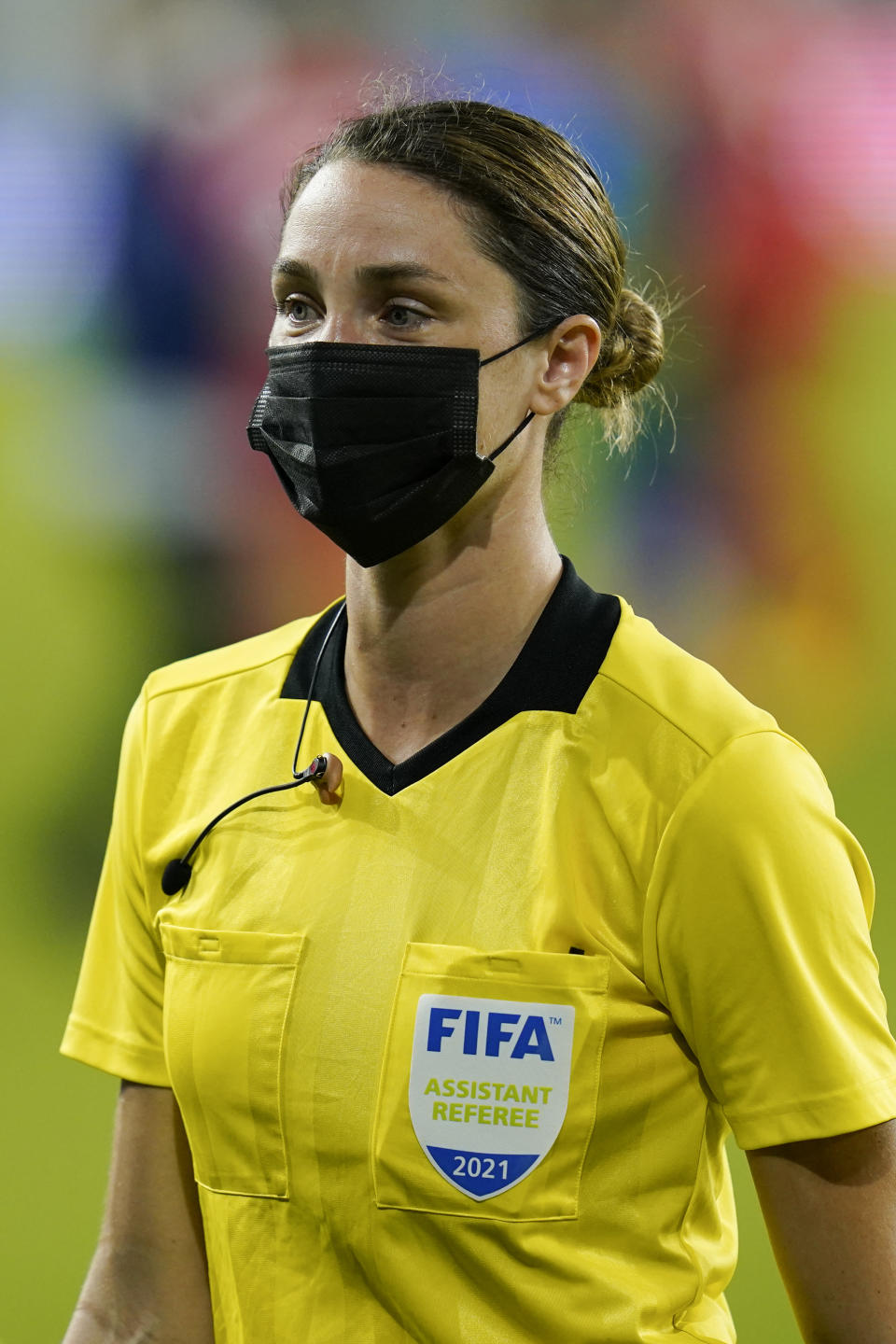 Assistant referee Kathryn Nesbitt leaves the field after a World Cup 2022 Group B qualifying soccer match between Bermuda and Canada, Thursday, March 25, 2021, in Orlando, Fla. Nesbitt, a 32-year-old from Philadelphia, had a breakthrough moment when she became the first woman to work as an on-field official for a World Cup qualifier in North and Central America and the Caribbean.(AP Photo/John Raoux)