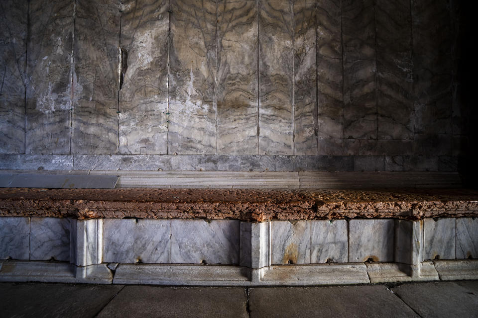 Signs of erosion are visible inside St. Mark's Basilica in Venice, northern Italy, Wednesday, Dec. 7, 2022. Glass barriers that prevent seawater from flooding the 900-year-old iconic Venice's Basilica during high tides have been recently installed in St. Mark's Square which is the lowest-laying city area and frequently ends up underwater during extreme weather. (AP Photo/Domenico Stinellis)