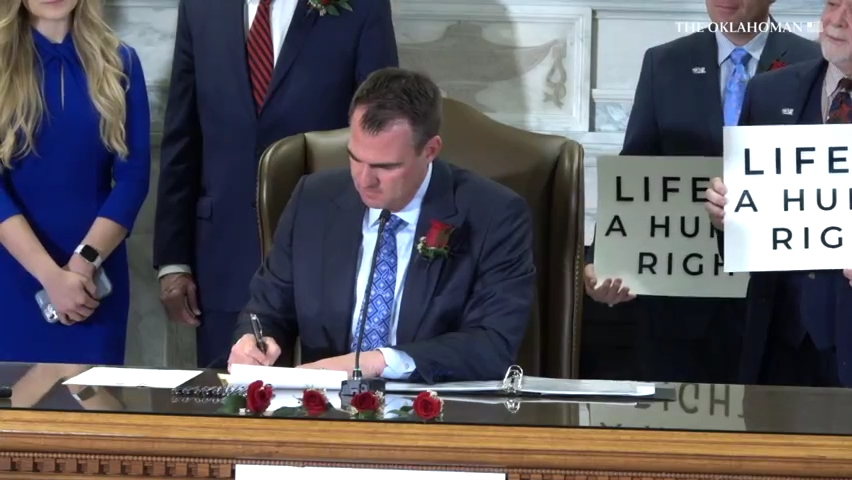 Gov. Kevin Stitt signed a bill to punish medical providers who perform abortions with up to 10 years in prison or fines of up to $100,000.