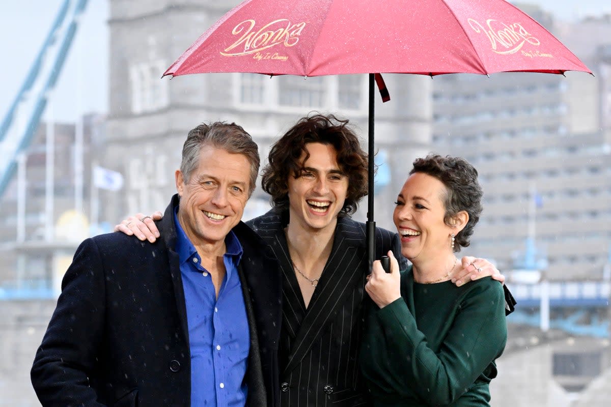 Hugh Grant, Timothée Chalamet and Olivia Colman at a Wonka photocall (Gareth Cattermole/Getty Images)