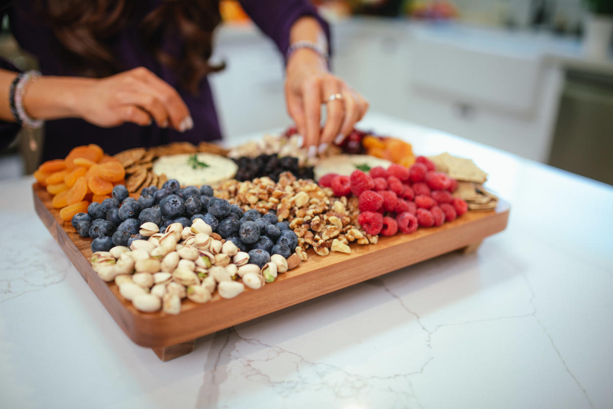 This nutty charcuterie board is filled with fresh and dried fruit, flavorful crackers and a selection of nuts. (Photo: Serena Poon)