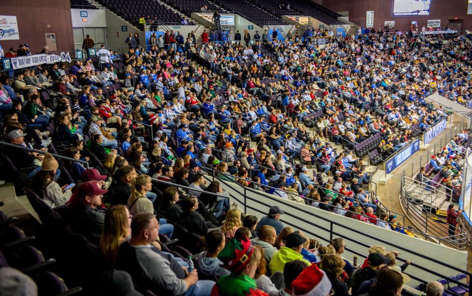 Hockey fans take in a Pensacola Ice Flyers game at the Pensacola Bay Center Saturday, December 23, 2023.