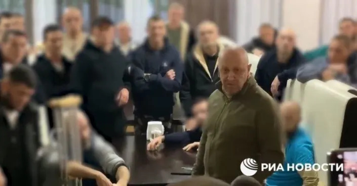 Yevgeny Prigozhin, head of the Wagner Group and an ally of Russian President Vladimir Putin, is seen in a video aired on January 12, 2023 by Russian state media addressing a group of men identified as the first set of former prisoners released in exchange for serving in Russia's war in Ukraine. / Credit: RIA Novosti