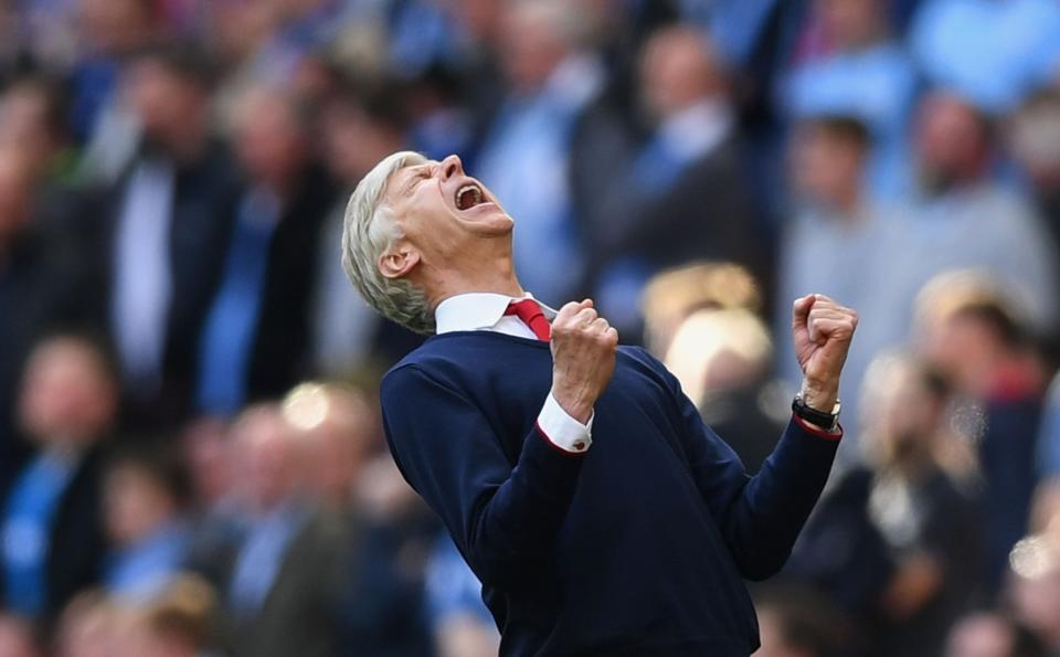 <p>Arsene Wenger celebrates as Alexis Sanchez edges the Gunners ahead against Manchester City in extra time </p>