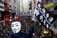 FILE PHOTO: Protesters march for human rights in Hong Kong