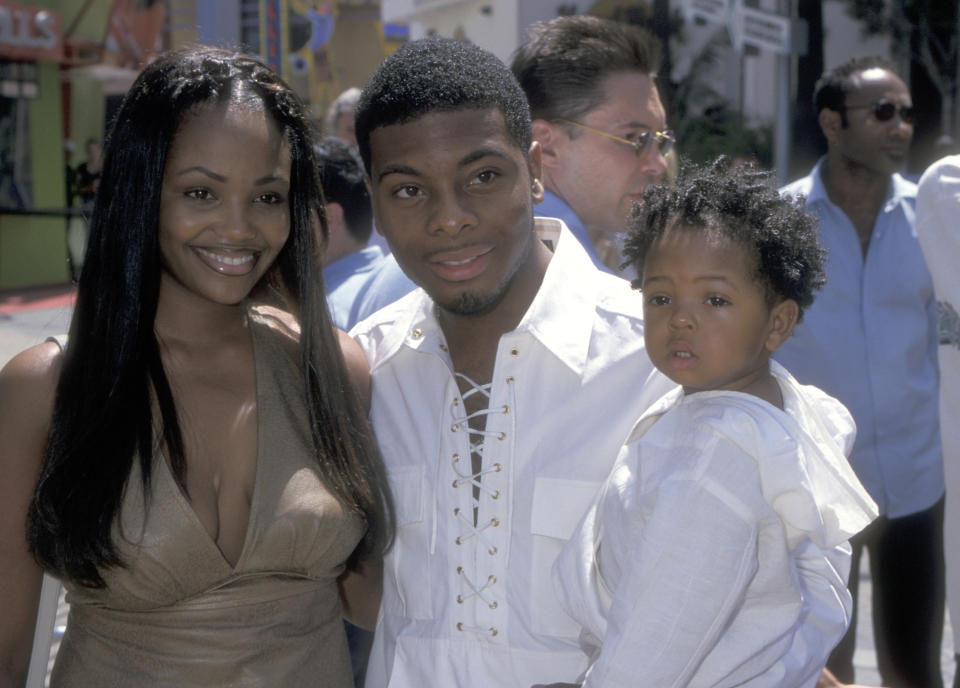 Kel Mitchell Tyisha Hampton and their daughter posing for a photo