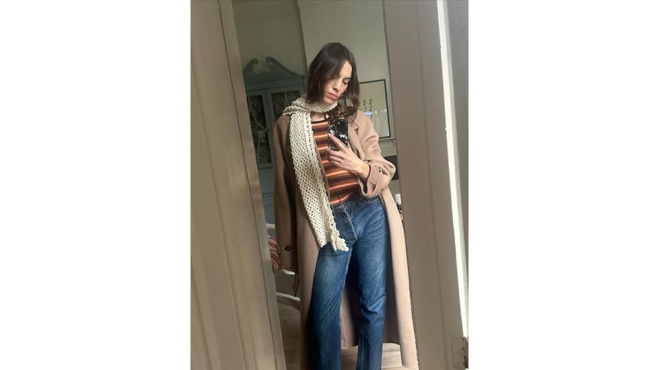 Alexa Chung shares a photo of herself in jeans and a striped jumper