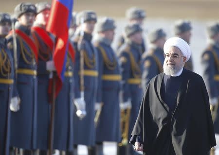 Iranian President Hassan Rouhani inspects the honour guard during a welcoming ceremony upon his arrival at Vnukovo International Airport in Moscow, Russia March 27, 2017. REUTERS/Maxim Shemetov