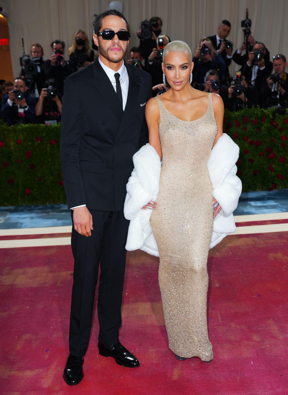 Pete Davdison helped Kim Kardashian to walk up the Met Gala steps. (Getty Images)