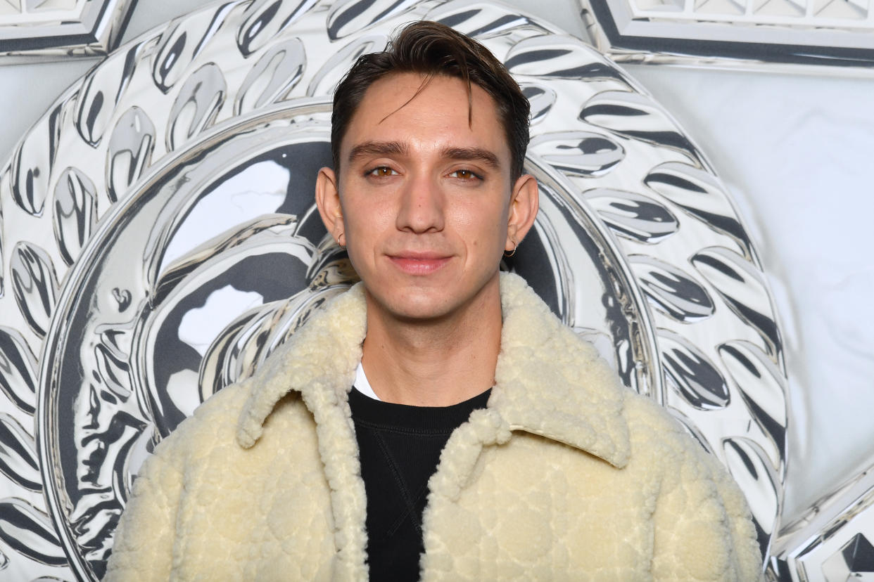 PARIS, FRANCE - JANUARY 21: (EDITORIAL USE ONLY - For Non-Editorial use please seek approval from Fashion House) Oliver Sim attends the Dior Homme Fall/Winter 2022/2023 show as part of Paris Fashion Week on January 21, 2022 in Paris, France. (Photo by Stephane Cardinale - Corbis/Corbis via Getty Images)