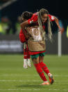 Morocco's Fatima Tagnaout, right, celebrates with teammates after the Women's World Cup Group H soccer match between Morocco and Colombia in Perth, Australia, Thursday, Aug. 3, 2023. (AP Photo/Gary Day)