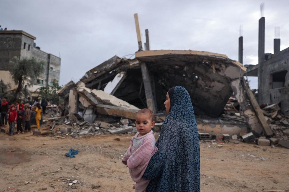 PHOTO: Palestinians inspect the destruction following overnight Israeli strikes on Rafah in the southern Gaza Strip on May 6, 2024. (AFP via Getty Images)