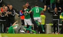 Football - Northern Ireland v Greece - UEFA Euro 2016 Qualifying Group F - Windsor Park, Belfast, Northern Ireland - 8/10/15 Josh Magennis celebrates with manager Michael O'Neill after scoring the second goal for Northern Ireland Action Images via Reuters / Jason Cairnduff