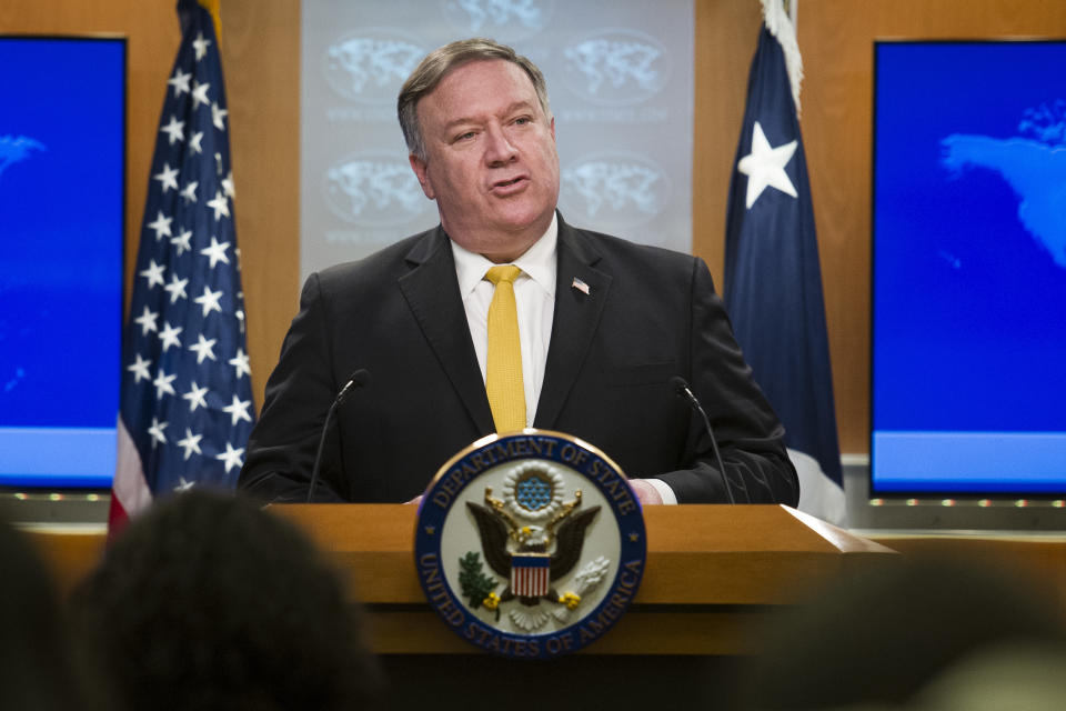 Secretary of State Mike Pompeo briefs reporters at the State Department in Washington, Wednesday, Oct. 3, 2018. Pompeo has announced that the U.S. is canceling a 1955 treaty with Iran establishing economic relations and consular rights between the two nations. (AP Photo/Cliff Owen)