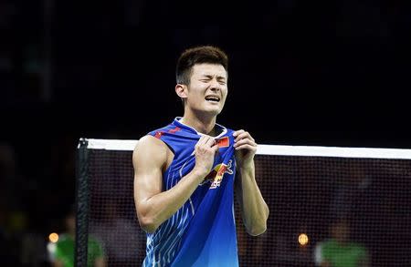 China's Chen Long reacts after winning the men's singles final against Malaysia's Lee Chong Wei at the Badminton World Championship in Copenhagen August 31, 2014. REUTERS/Liselotte Sabroe/Scanpix Denmark