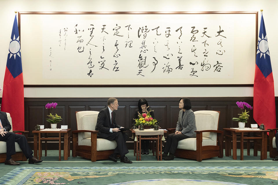 In this photo released by the Taiwan Presidential Office, William Brent Christensen, director of the American Institute in Taiwan eat right meets with Taiwan President Tsai Ing-wen, at left in the Presidential Office in Taipei, Taiwan. The Taiwanese president sat down with the top American official in Taipei on Sunday, one day after her landslide victory over challenger Han Kuo-yu of the opposition Nationalist Party.(Taiwan Presidential Office via AP)