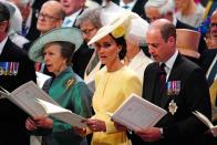<p>The Princess Royal, the Duchess of Cambridge, and the Duke of Cambridge sing inside St. Paul's Cathedral.</p>