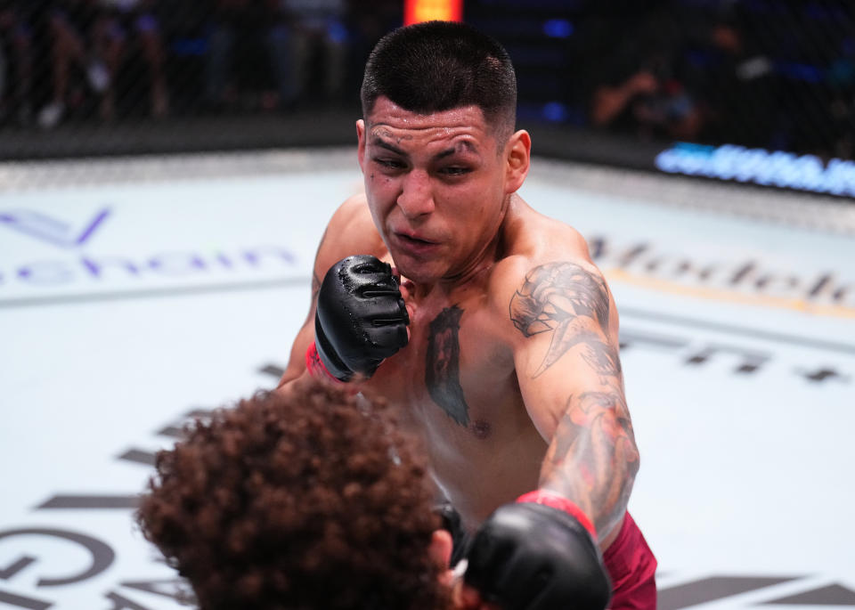 LAS VEGAS, NEVADA – SEPTEMBER 12: (R-L) James Llontop of Peru punches Malik Lewis of Germany in a lightweight fight during Dana White’s Contender Series season seven, week six at UFC APEX on September 12, 2023 in Las Vegas, Nevada. (Photo by Chris Unger/Zuffa LLC via Getty Images)