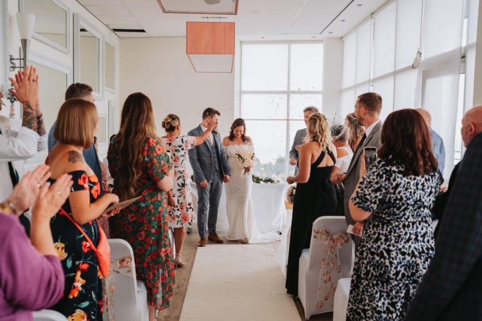 Samantha and Andy Morris at their wedding in Essex (Daniel Farley)