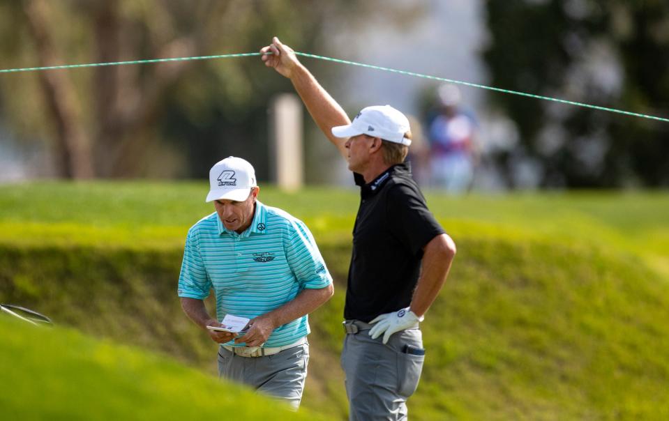 Steve Stricker holds up the rope for Steven Alker as they head to the tee box of 18 during the final round of the Galleri Classic in Rancho Mirage, Calif., Sunday, March 26, 2023. 