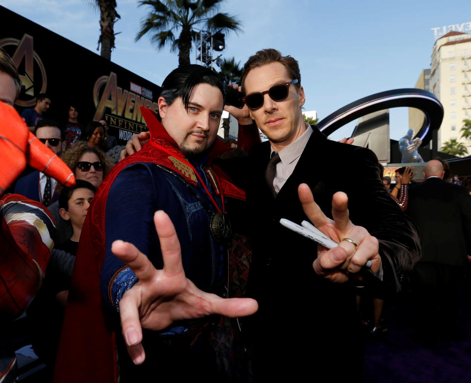 REFILE - CORRECTING TYPO IN NAME Premiere of “Avengers: Infinity War” - Arrivals - Los Angeles, California, U.S., 23/04/2018 - Actor Benedict Cumberbatch poses with a fan in costume. REUTERS/Mario Anzuoni