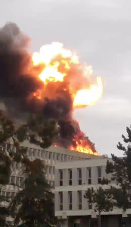 Fire breaks out on the rooftop of Lyon university, in Lyon, France January 17, 2019, in this still image obtained from a social media video. Twitter/ @PODEUS69 via REUTERS