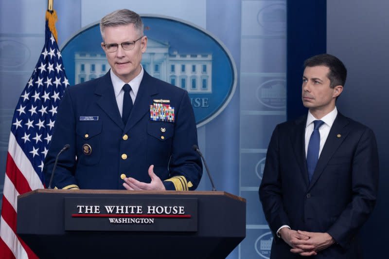 Vice Admiral Peter Gautier (L), deputy commandant for operations for the United States Coast Guard, and U.S. Secretary of Transportation Pete Buttigieg take part in a news conference Wednesday in the James Brady Press Briefing Room of the White House. Gautier says the first challenge will be removing the trusses from the bridge and the bow of the ship. Photo by Michael Reynolds/UPI