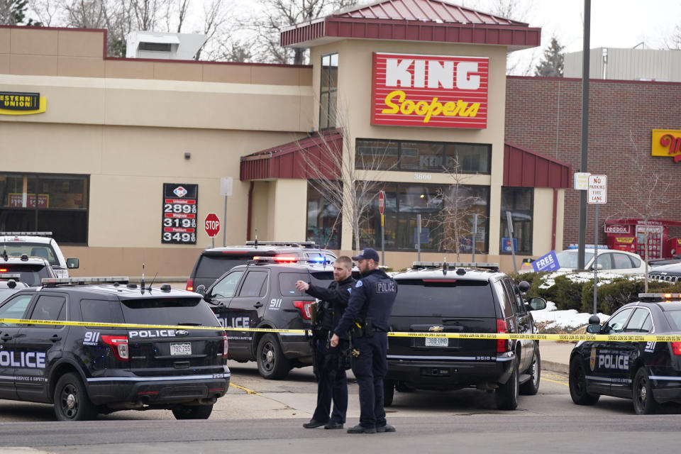 Police work on the scene outside of a King Soopers grocery store where a shooting took place Monday, March 22, 2021, in Boulder, Colo. (AP Photo/David Zalubowski)