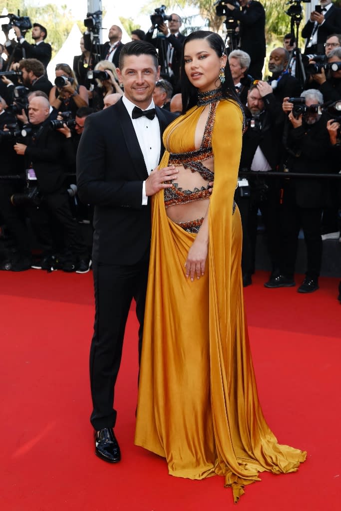 Adriana Lima and Andre Lemmers attend the world premiere of “Elvis” at the 2022 Cannes Film Festival on May 25, 2022. - Credit: MEGA