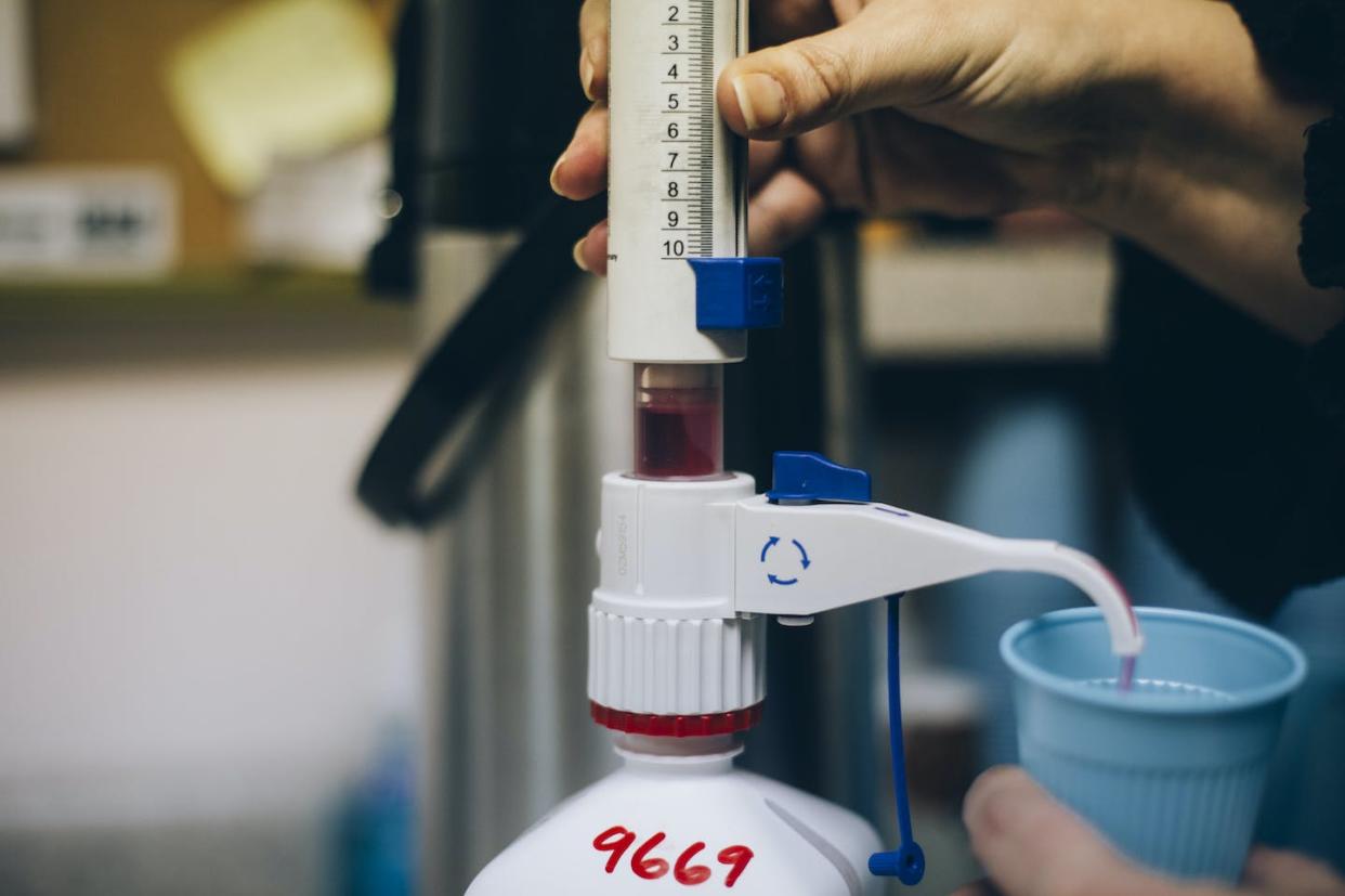 A nurse dispenses liquid Methadose, an FDA-approved medication that helps people addicted to opioids. <a href="https://www.gettyimages.com/detail/news-photo/vanessa-leavitt-dispenses-a-dosage-of-the-liquid-form-of-news-photo/462014722" rel="nofollow noopener" target="_blank" data-ylk="slk:Whitney Hayward/Portland Press Herald via Getty Images;elm:context_link;itc:0;sec:content-canvas" class="link ">Whitney Hayward/Portland Press Herald via Getty Images</a>